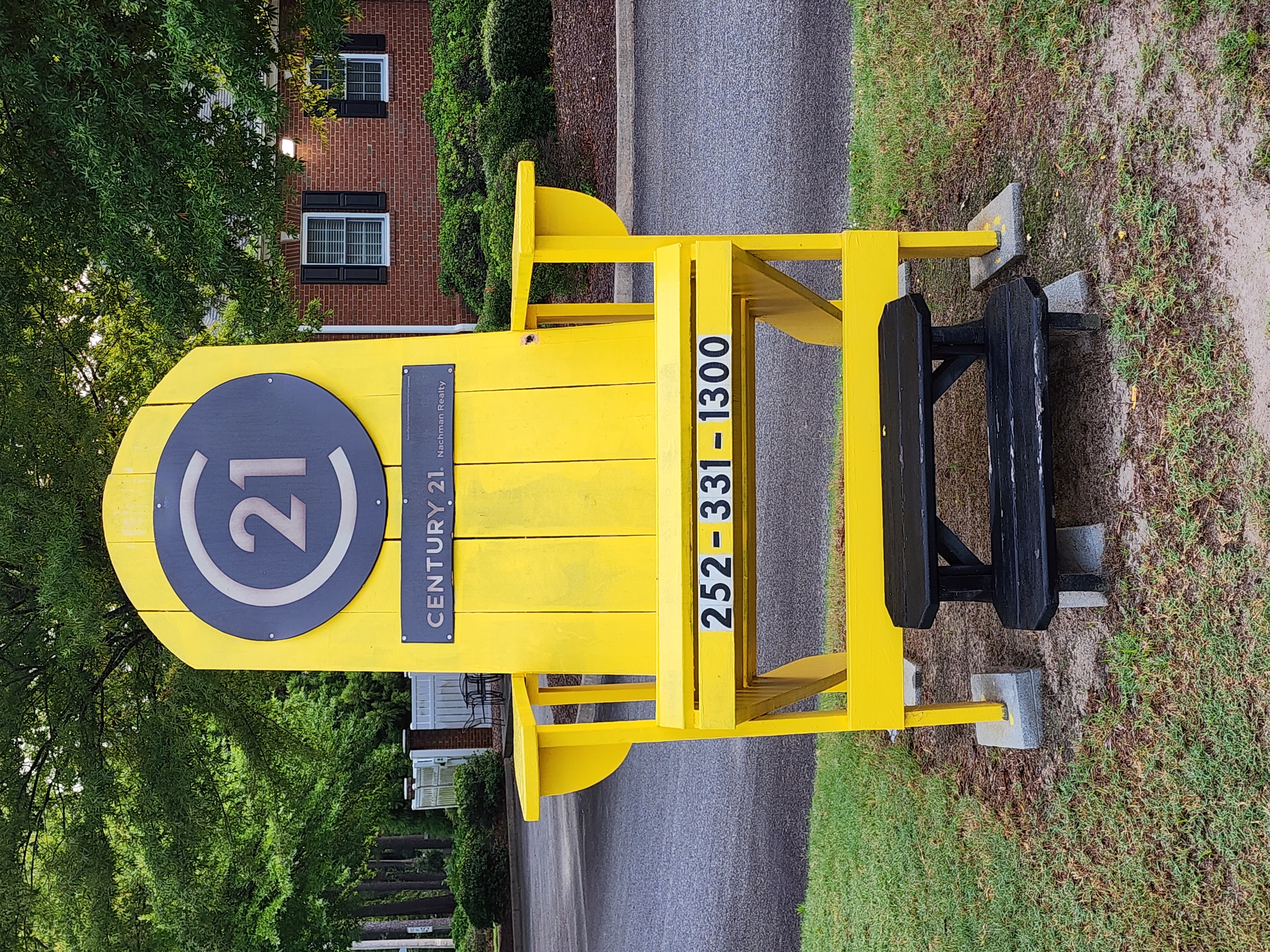 C21 Nachman Realty Elizabeth City Yellow Chair